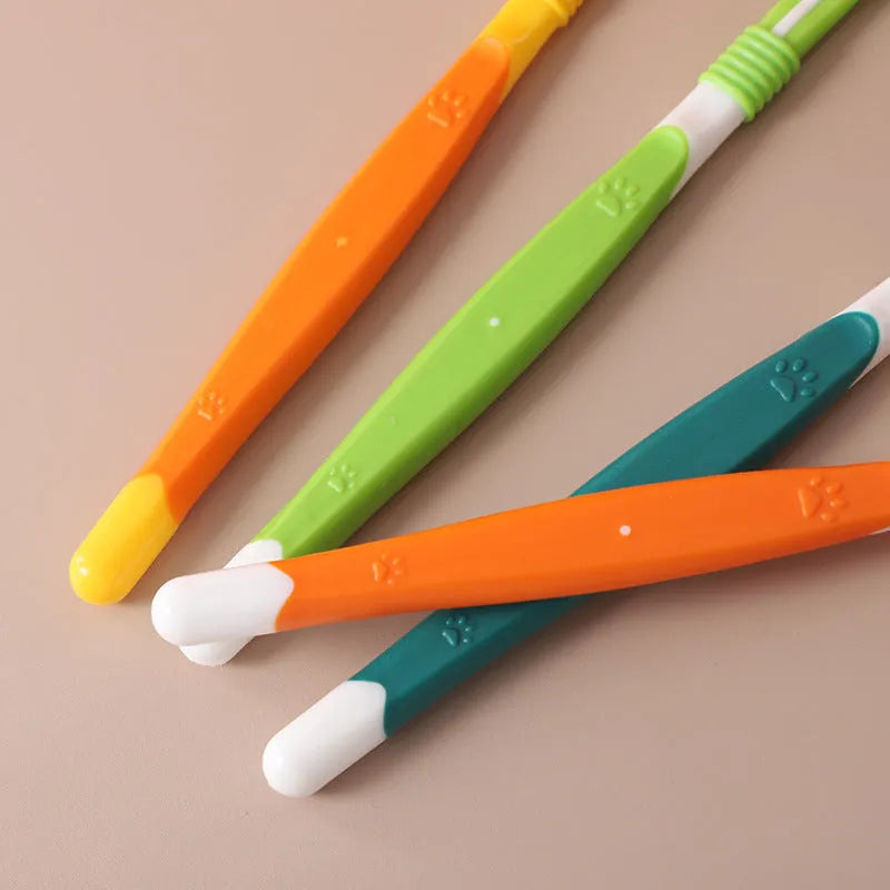 Pet toothbrush in assorted colours with plastic handle and nylon bristles for dog and cat dental care