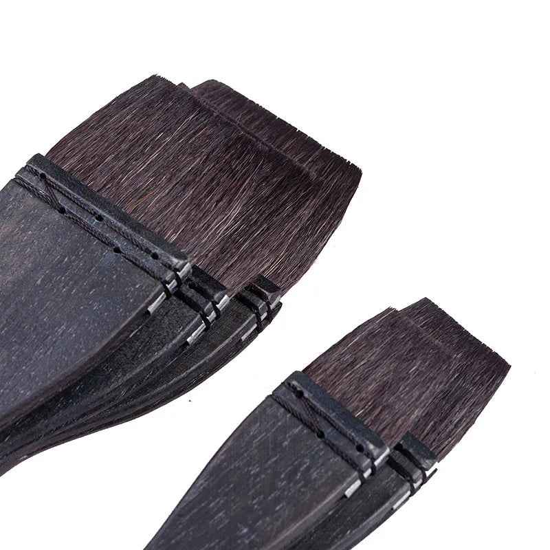 Professional grey squirrel hair makeup brush with a wooden handle, shown in multiple sizes.