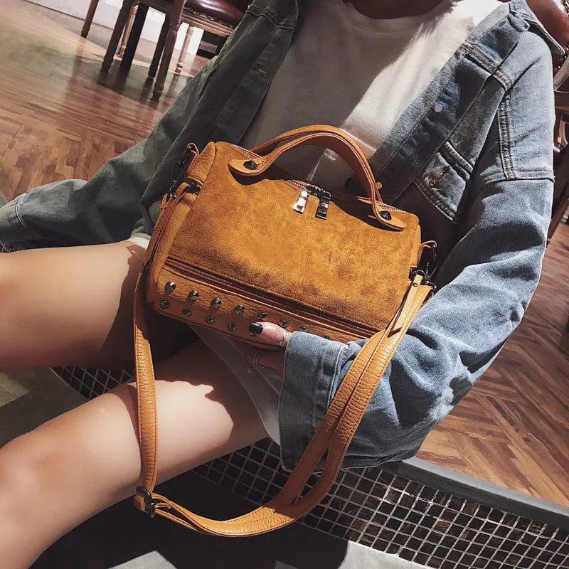Soft PU leather casual tote shoulder bag for women in black, showing large capacity and zip closure.