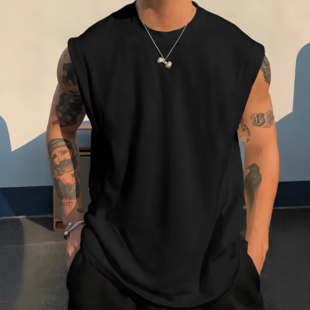 Men's loose solid colour cotton sleeveless tank top on a hanger, showing straight hem design.