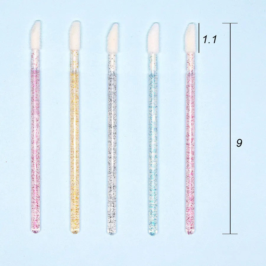 Crystal rod lip brush with man-made fibre bristles, 9cm total length, red colour, on white background
