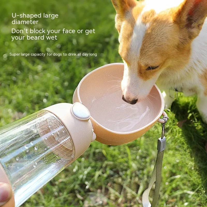 Portable plastic dog water bottle with attached feeding bowl in yellow colour.