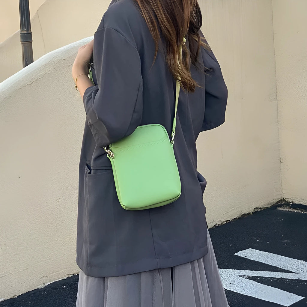 Small solid colour crossbody shoulder bag for mobile phones in beige.