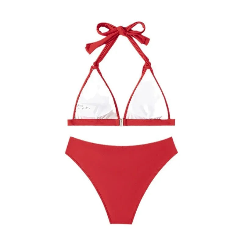 Red women's lace-up halterneck bikini set with split beach style shorts