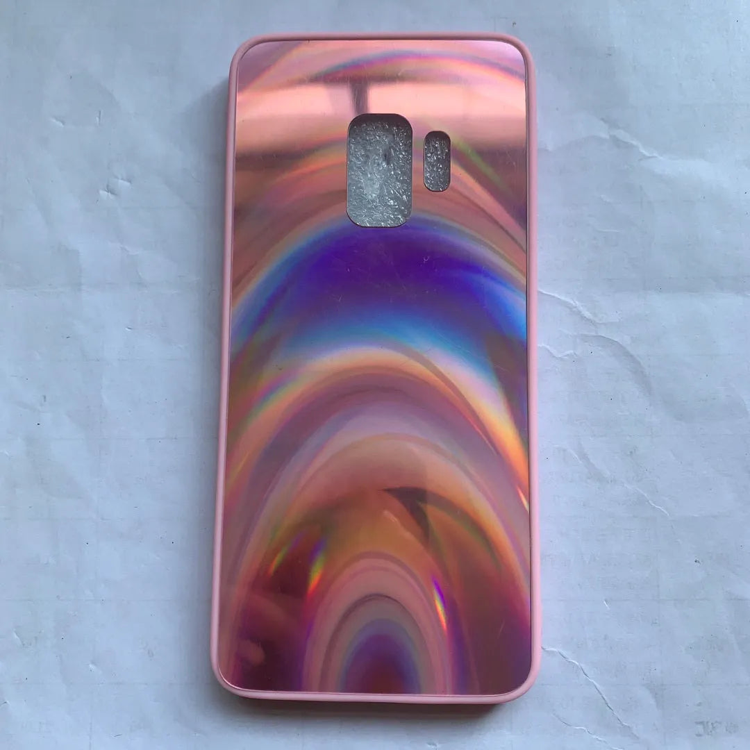 A 3D rainbow glitter gradient back cover case for a smartphone, showing its full-coverage design and sparkling finish.