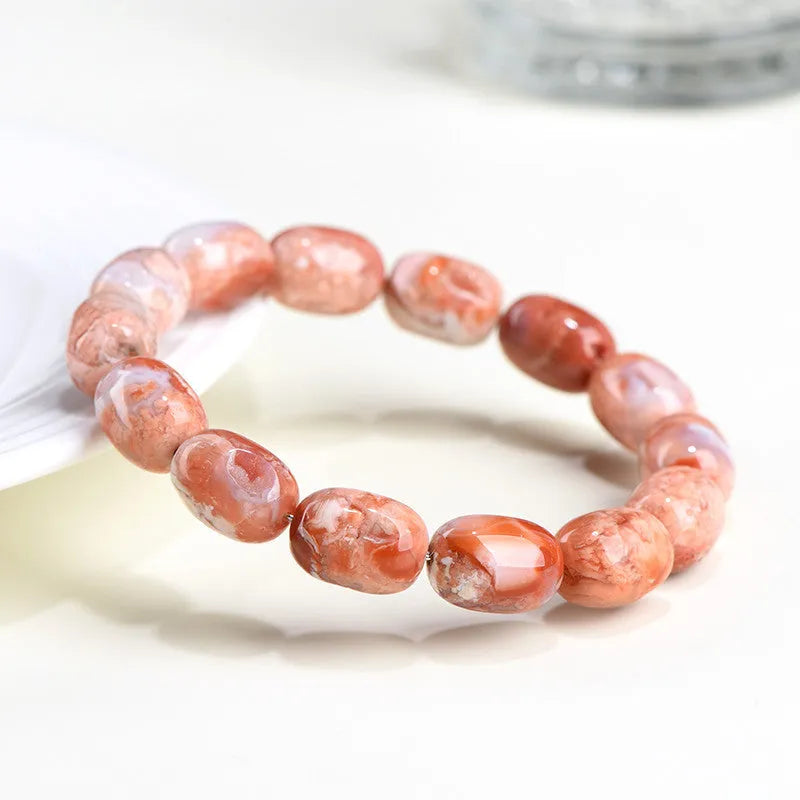 Natural cherry agate barrel bead bracelet with ruyi decorative elements