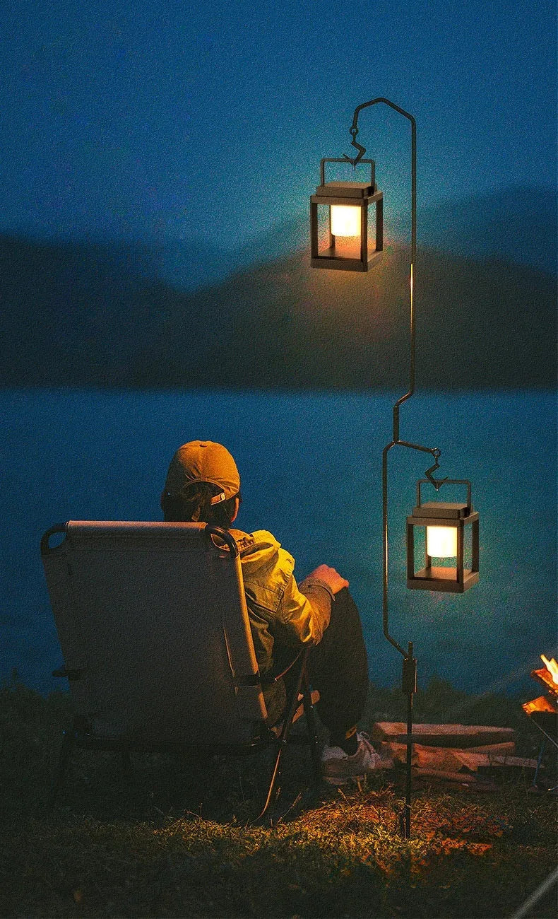 Outdoor USB handheld multifunctional charging ambient light lantern with black cover and white shell