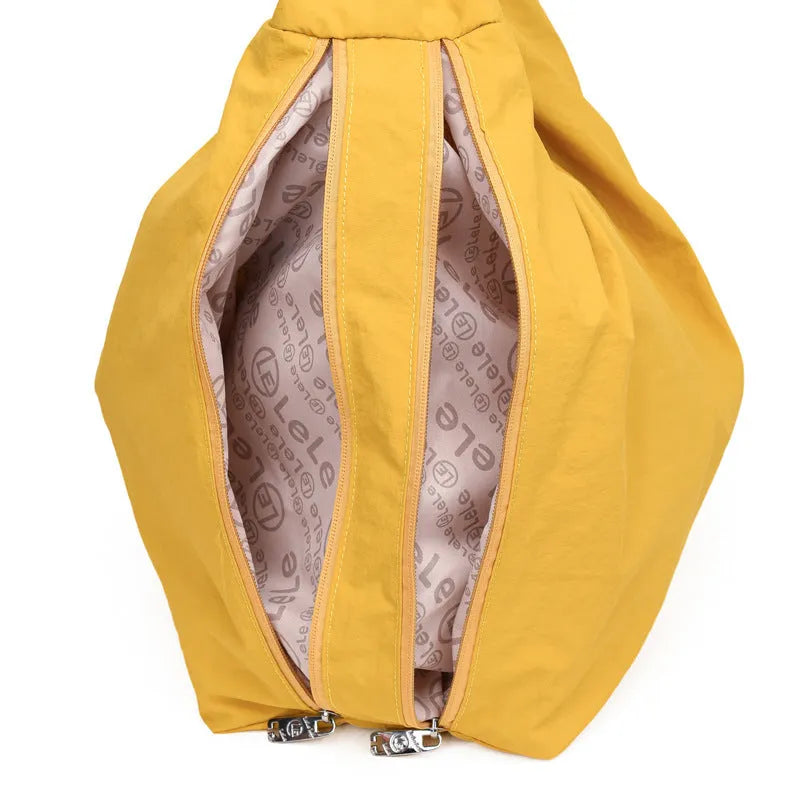 Soft nylon women's underarm bag in heart shape design showing large capacity