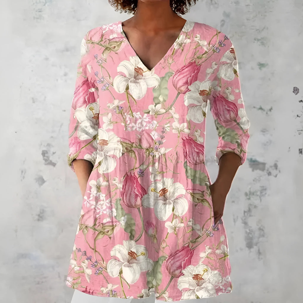 Women's retro-style slim-fit long-sleeved top with a colourful digital print pattern, shown on a model.