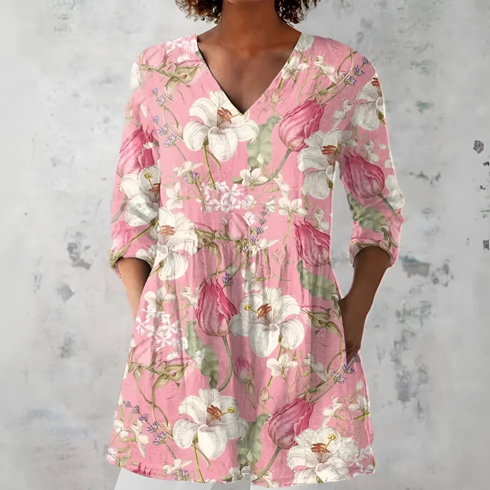 Women's retro-style slim-fit long-sleeved top with a colourful digital print pattern, shown on a model.