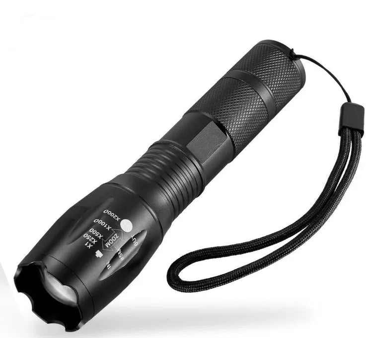 Black aluminium zoomable LED flashlight with adjustable focus ring and anti-skid body.