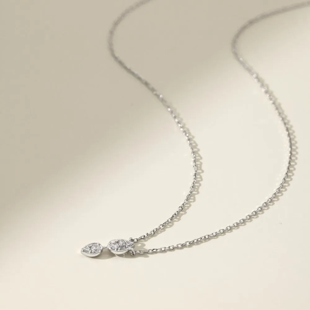 925 silver water drop necklace with round zircon and O-ring chain on display