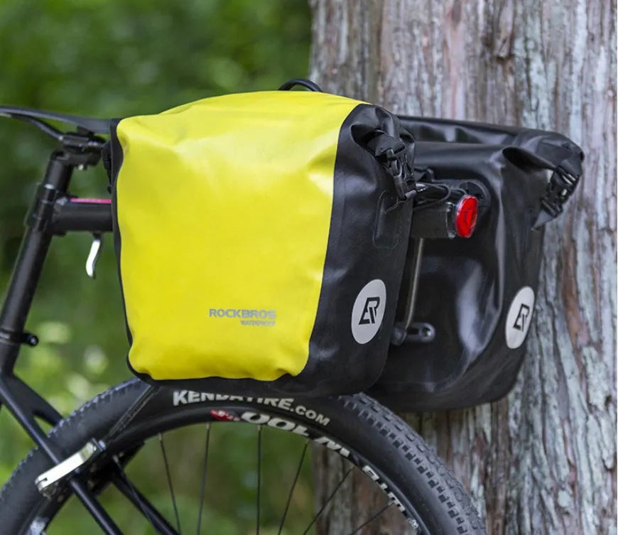 Bicycle waterproof bag made of nylon cloth and waterproof fabric, black colour, shown on a bike for cycling storage