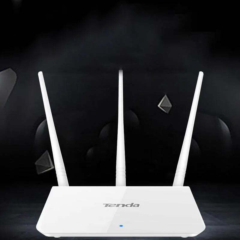 White dual-band wireless broadband router with UK-style three-pin plug on a wooden desk.
