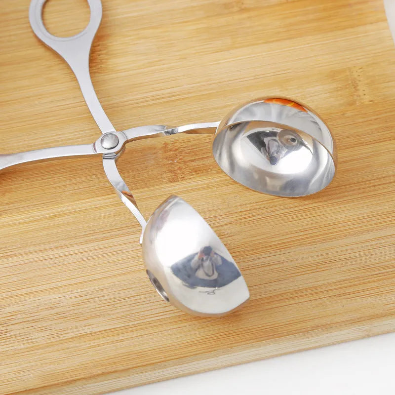 Stainless steel meatball maker tool clip with water-polished finish forming a uniform ball