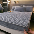 Fleece-lined milk fiber quilted fitted sheet in blue for single bed winter warmth