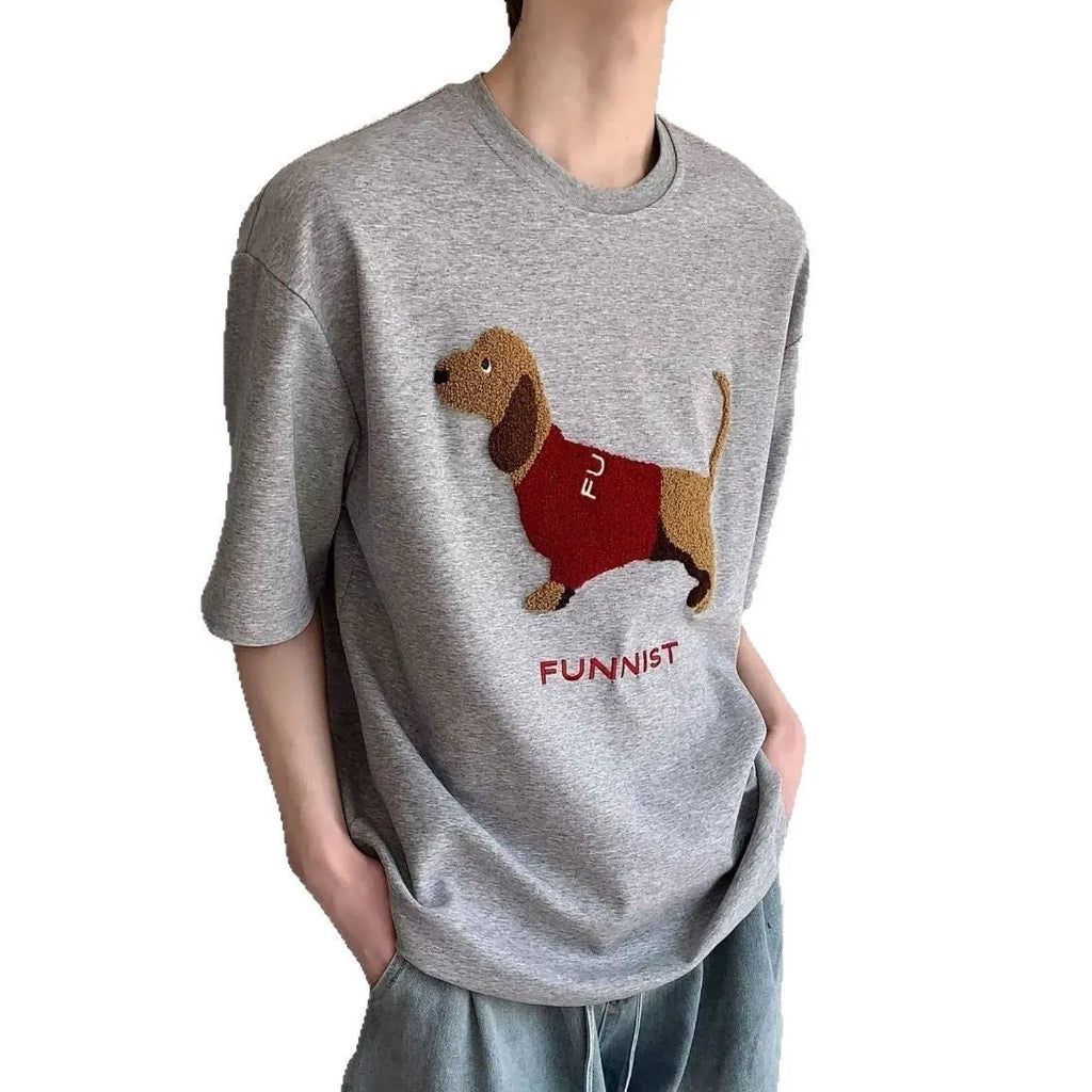 Men's grey cotton T-shirt with a black embroidered sausage dog design on the chest.