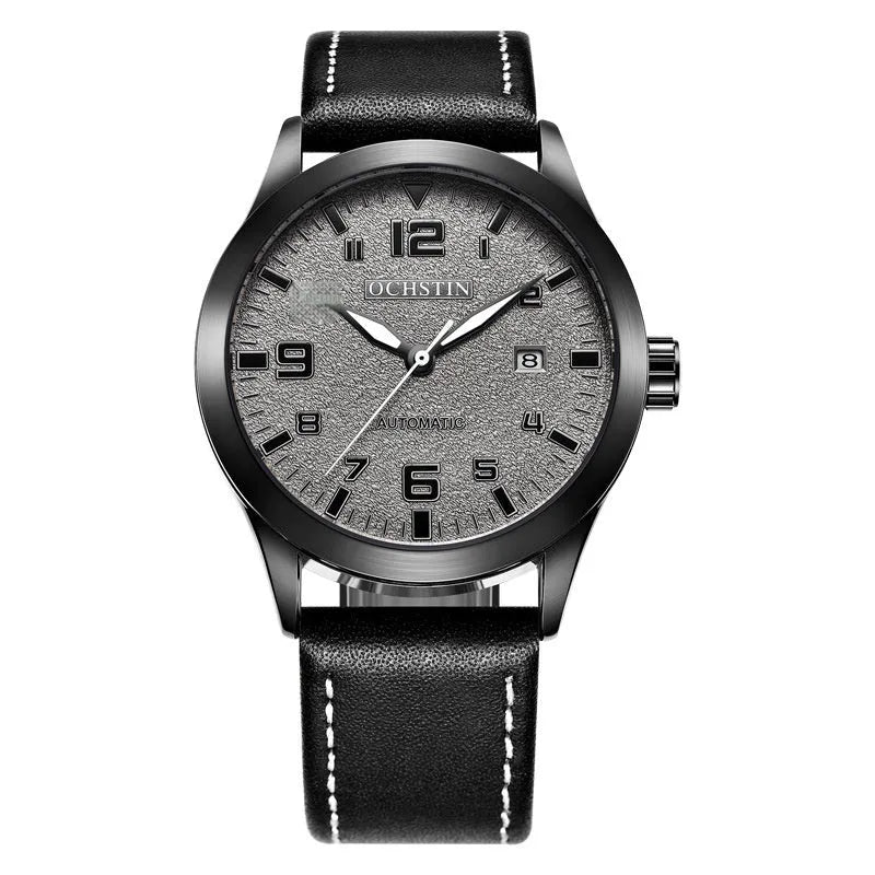 Men's automatic mechanical watch with leather strap on wrist, showing business casual retro style.