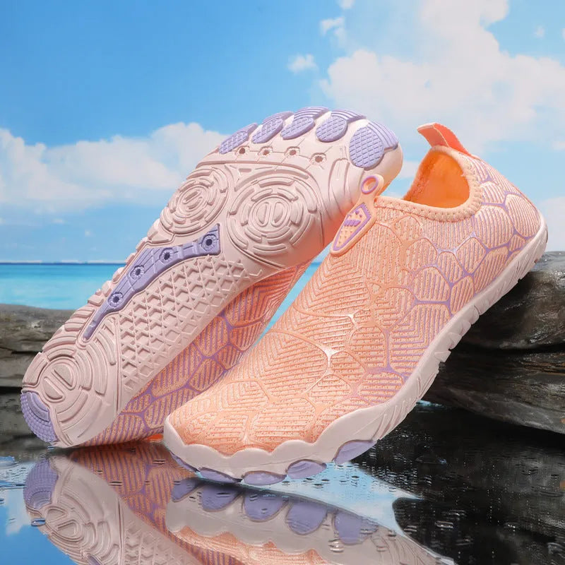 Outdoor hiking shoes with a front strap fastening and a non-slip sole with visible nails.