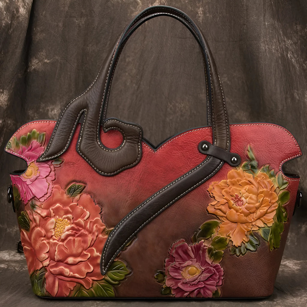Women's genuine cowhide leather tote bag with floral embossing and zipper closure, horizontal square shape