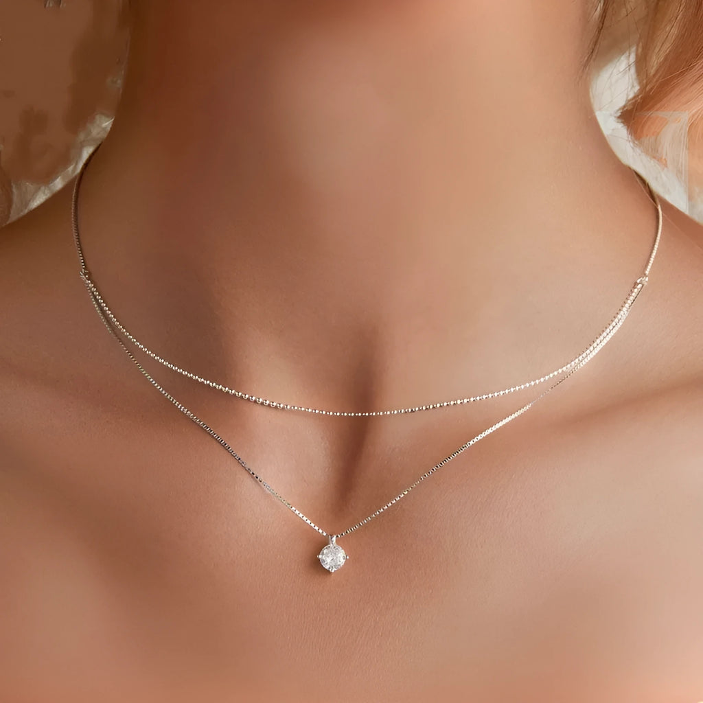Silver double-layer necklace with pearl chain and pendant made from 925 sterling silver
