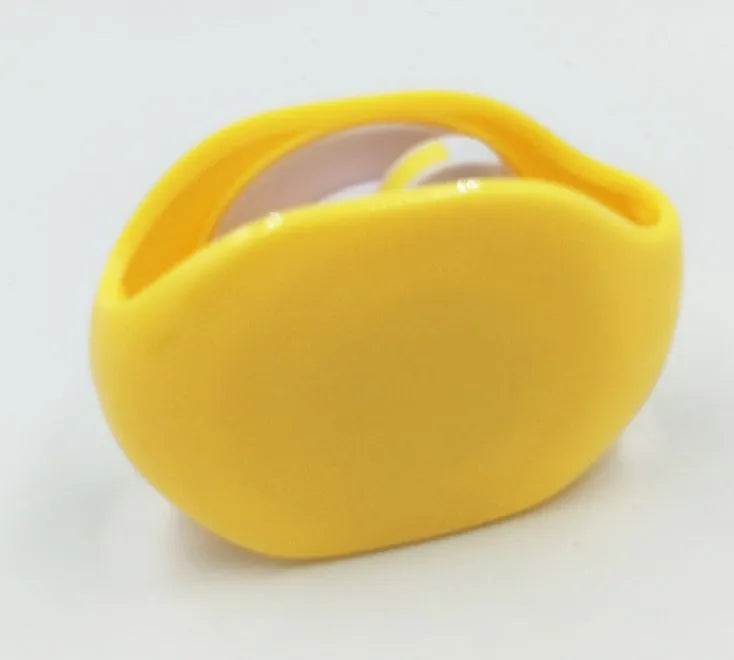 Compact automatic earphone winder in multiple colours on a grey background, showing extended cable.