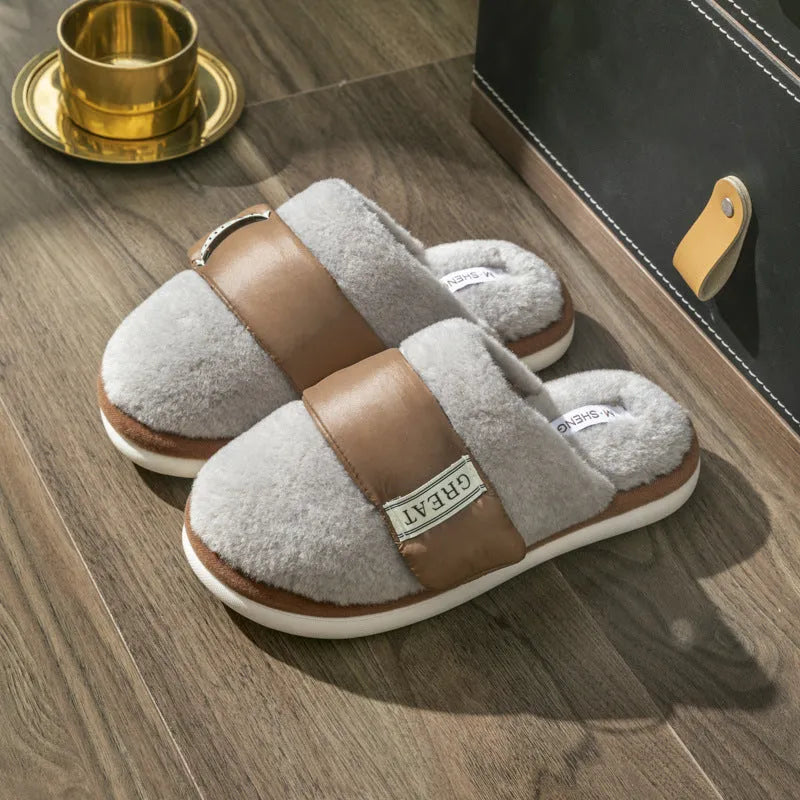 Women's beige plush floor slippers with round toe, flanging detail, and textured plastic sole.