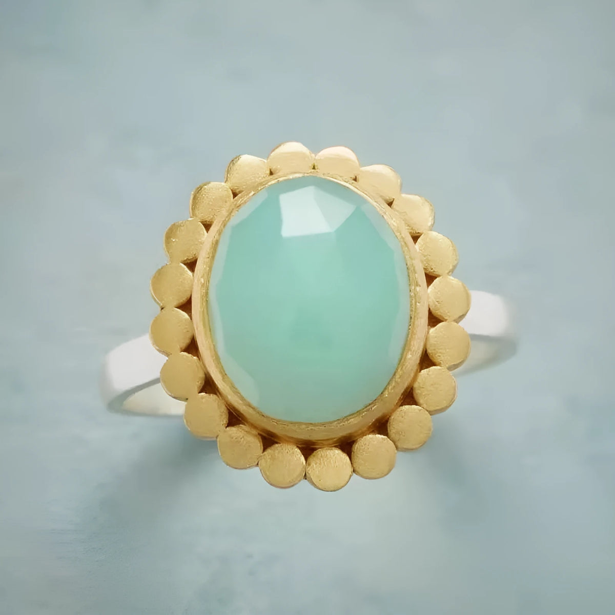 Green zircon ring with copper band and electroplated finish, shown in one of three colour styles, sizes 5 to 13