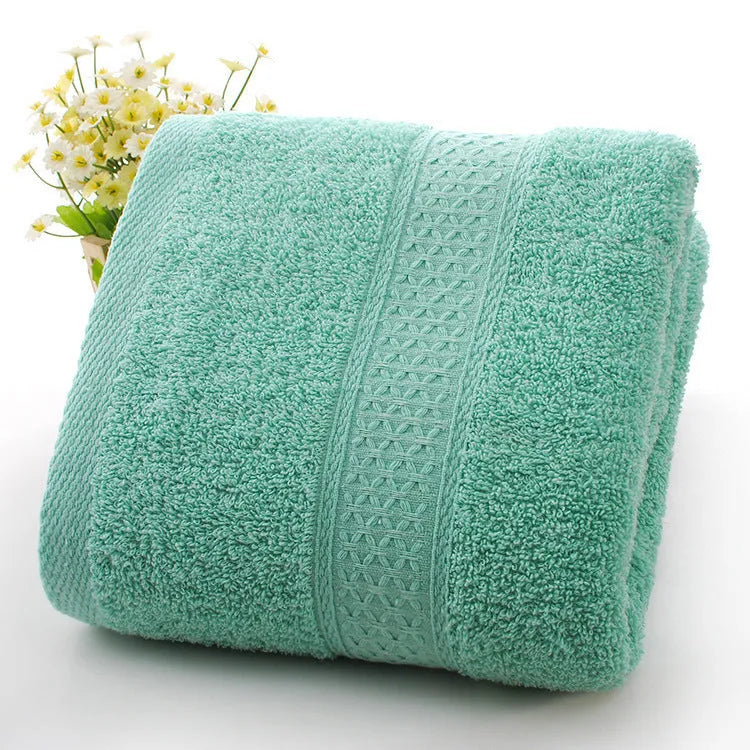 Thickened bath beach towel in seven colour options made from 80% cotton 20% polyester blend