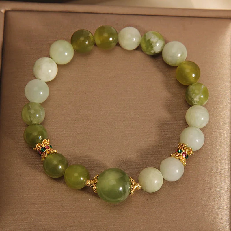 Women's Xiuyan jade bracelet in post-rain green colour with original design