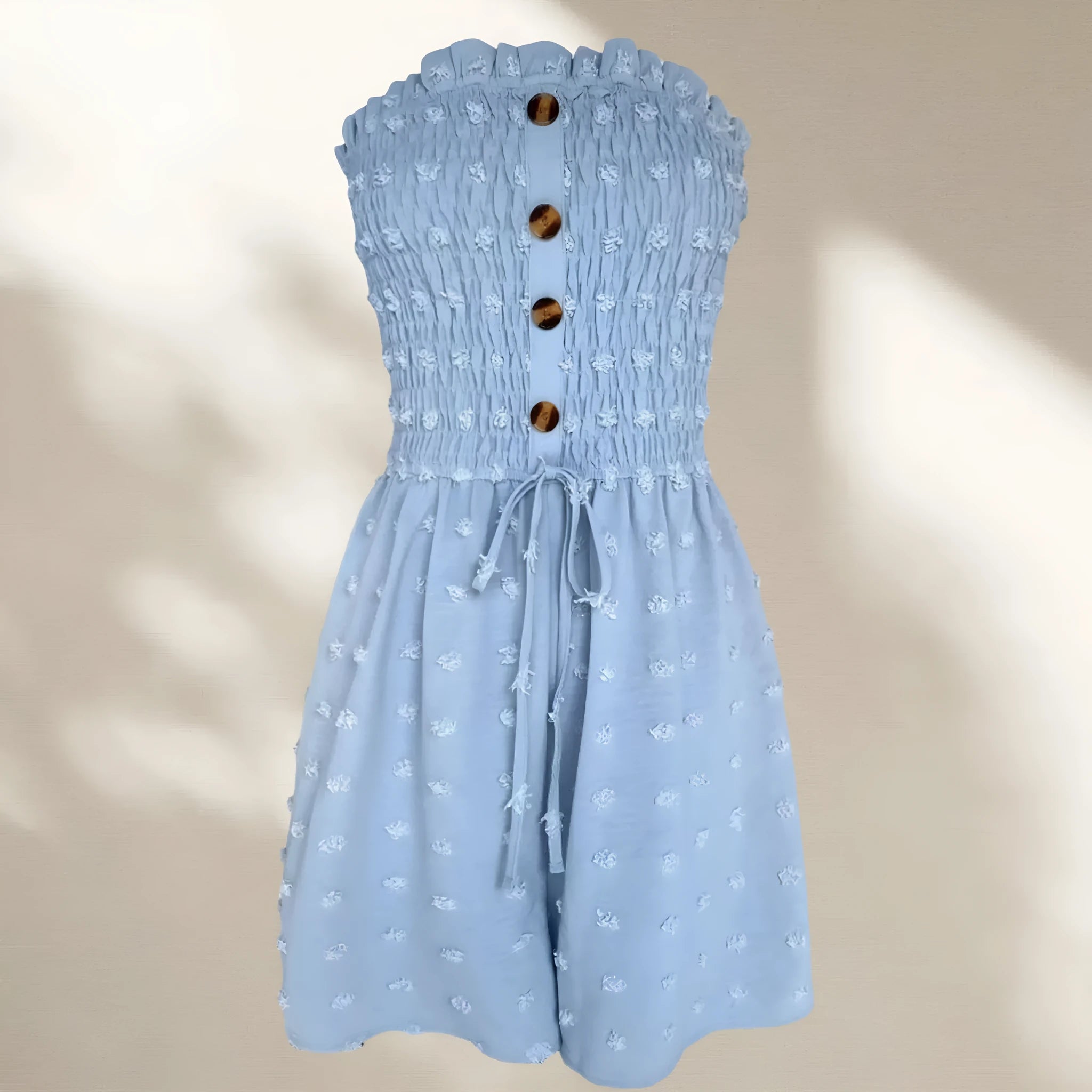 Women's sleeveless off-shoulder jumpsuit in polyester fabric showing blue colour option with button detailing