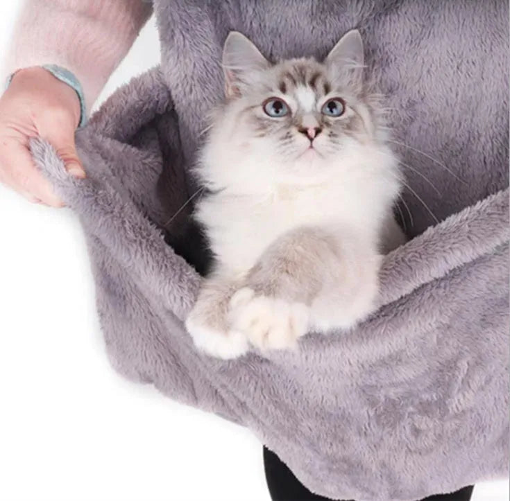 Grey pet carrying bag with sleeping chest apron on a table, showing double-sided arcum material and 70x62 cm size