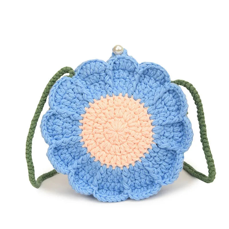 Round hand-woven bag with crocheted wool flowers and mobile phone pocket
