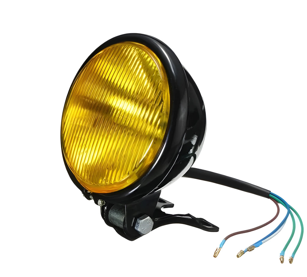 Round bottom mount motorcycle headlight with black aluminium shell, amber glass lens, 12.5 x 8.5 cm, front placement