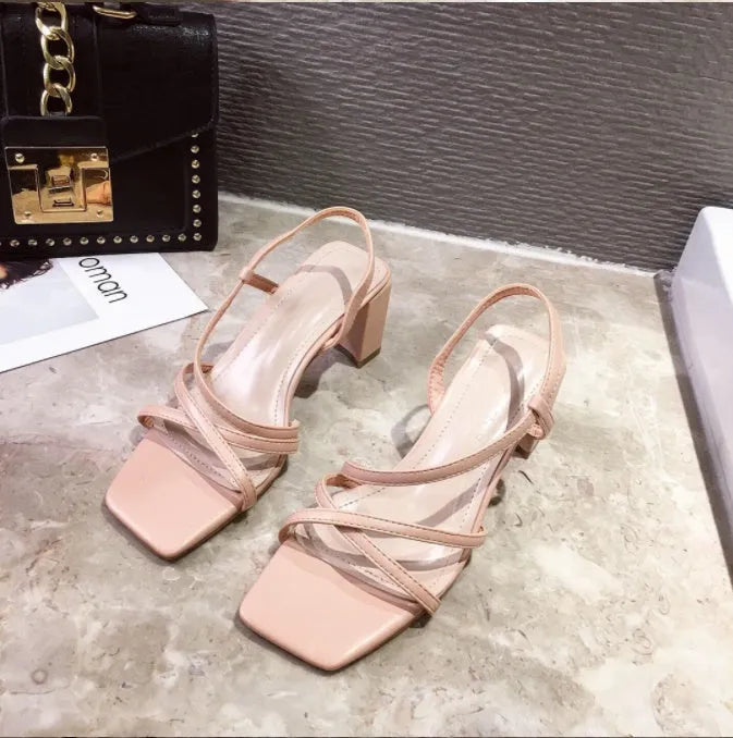Women's thick heel sandals in apricot colour with super high heel and sleeve-on design.