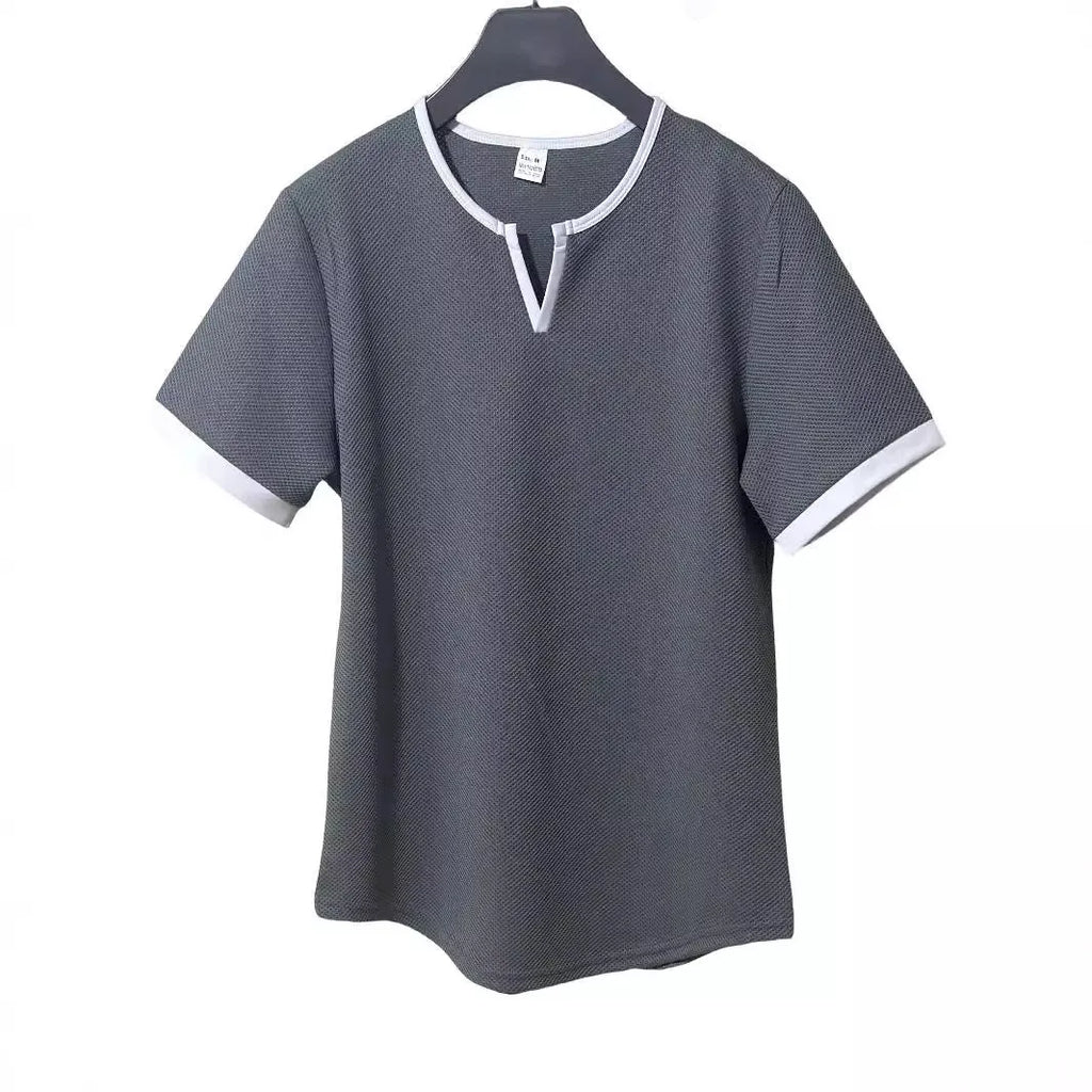 Colour-block waffle textured V-neck sports t-shirt in polyester on a size chart.