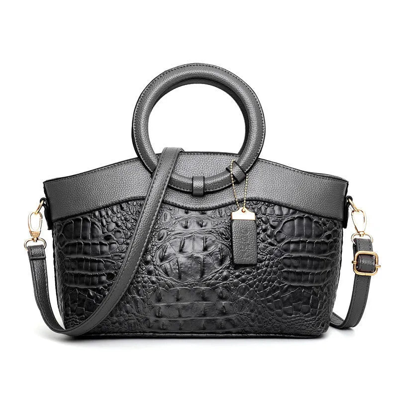 A casual fabric ladies handbag showing internal phone slot and ID card slot.