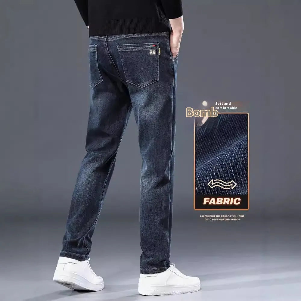Blue grey slim straight casual trousers on a hanger, showing mid waist and straight leg design.