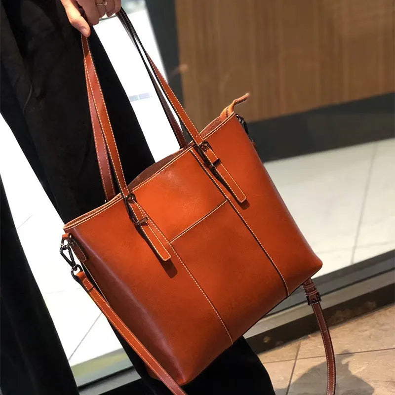 Brown genuine leather women's retro shoulder bag with three straps and horizontal square shape