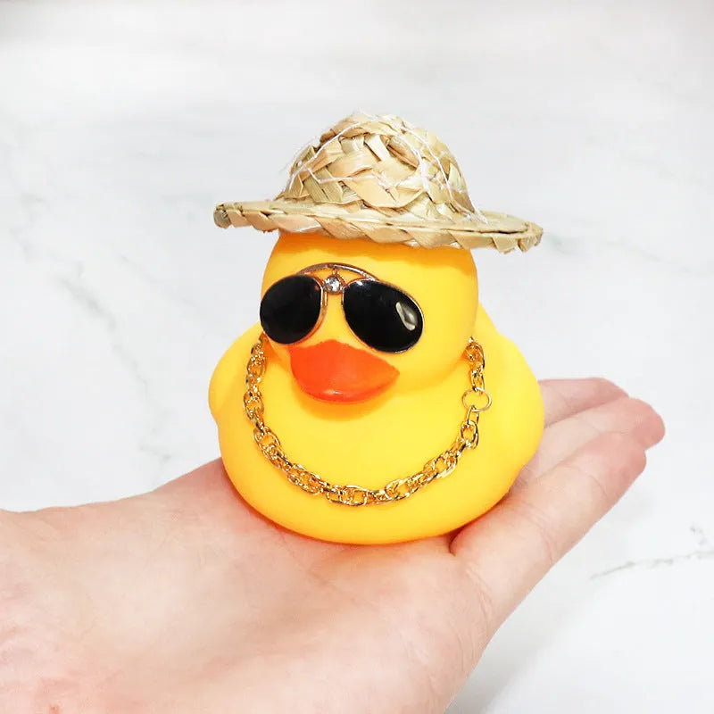 Straw hat yellow duck car dashboard ornament with sunglasses necklace accessory on car interior
