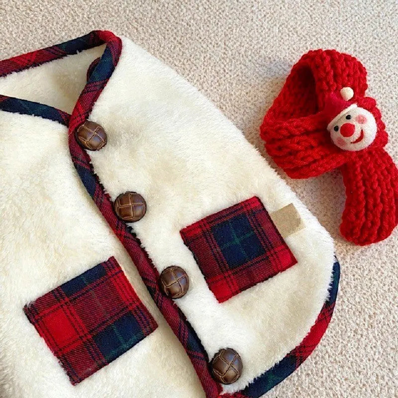 Navy blue pet fleece jacket with checkered pattern, Sherpa lining, decorative buttons, and snowman accent on a small dog