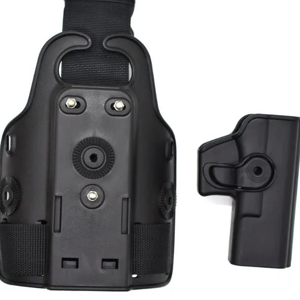 Tactical leg holster with waist plate and quick-pull plastic construction in outdoor setting