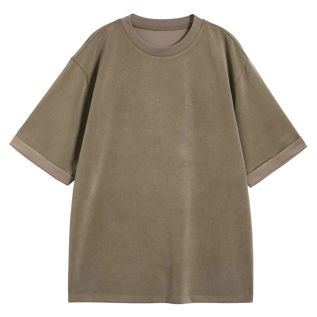 A man's loose-fit drape knit T-shirt in a solid colour, shown in brown, white, and black options.
