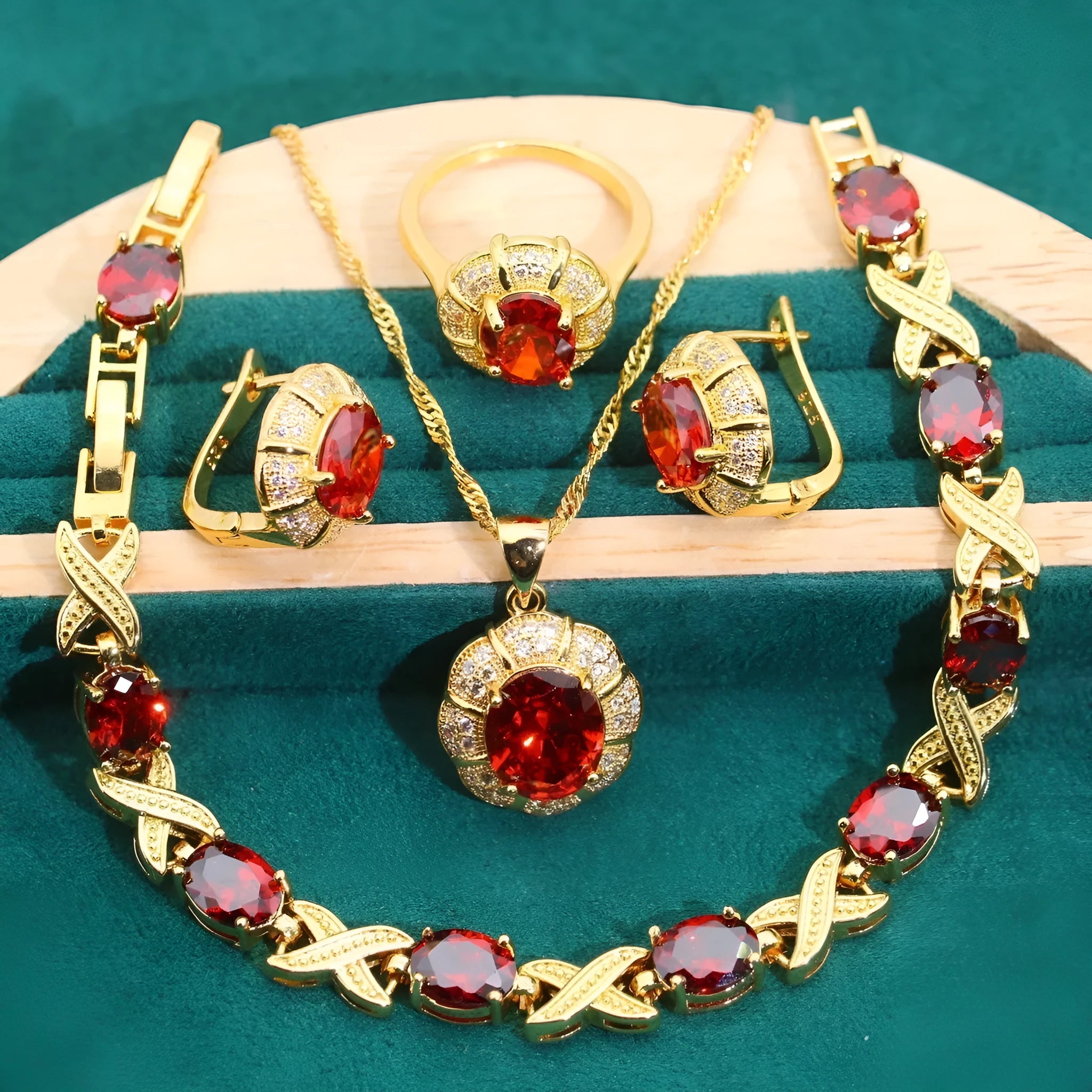 18k gold plated jewellery set showing necklace, earrings, ring, and bracelet with multi-colour cubic zirconia stones.