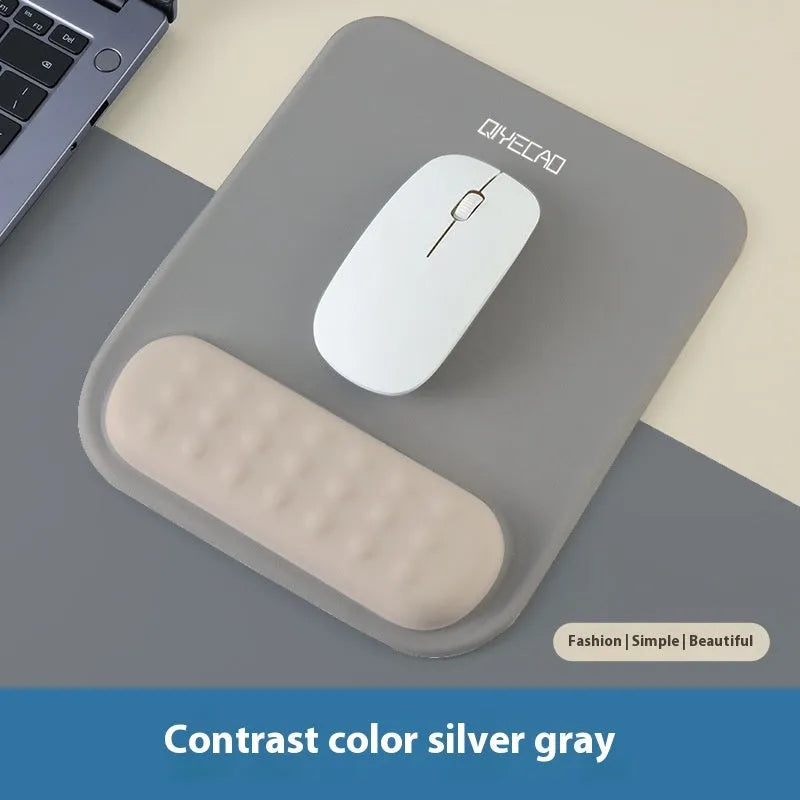 Ergonomic cloth silicone mouse pad for wrist support in a contrast colour style.