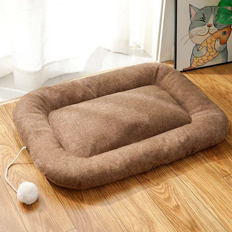 Kennel cooling cushion with removable cover in brown, shown next to S, M, L, XL size indicators