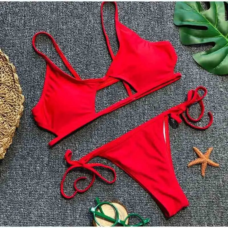 Ladies two-piece bikini swimwear set in polyester and spandex, available in black or red, sizes S M L