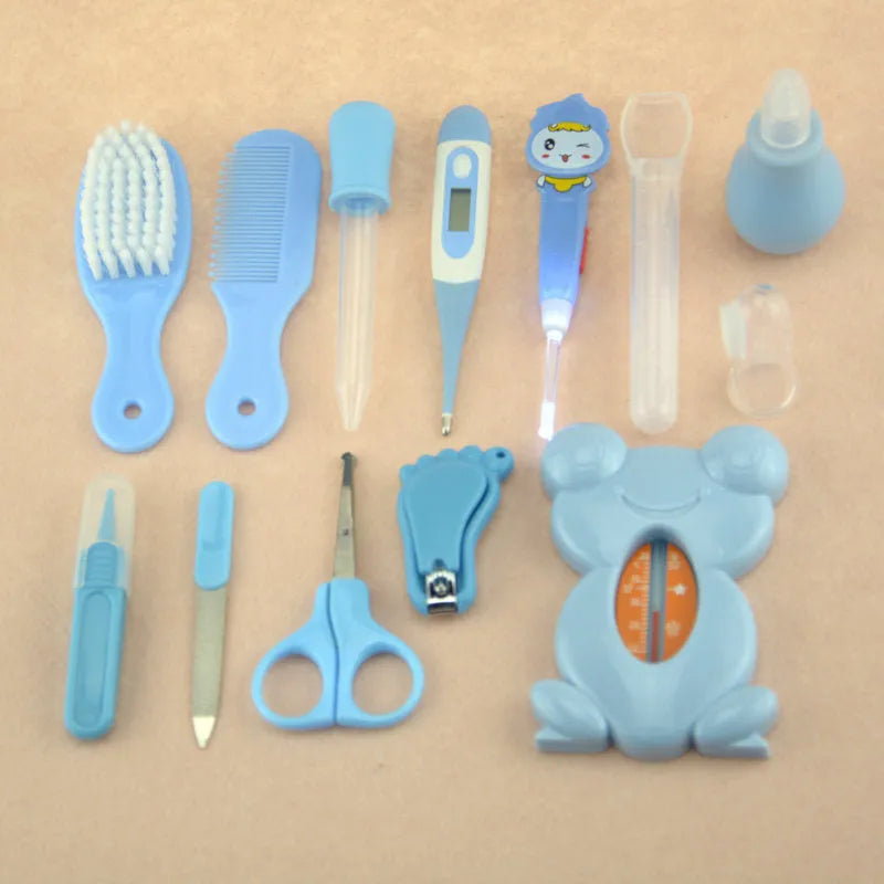 Roadfisher newborn baby care kit with grooming tools and health monitoring devices in blue or pink colour