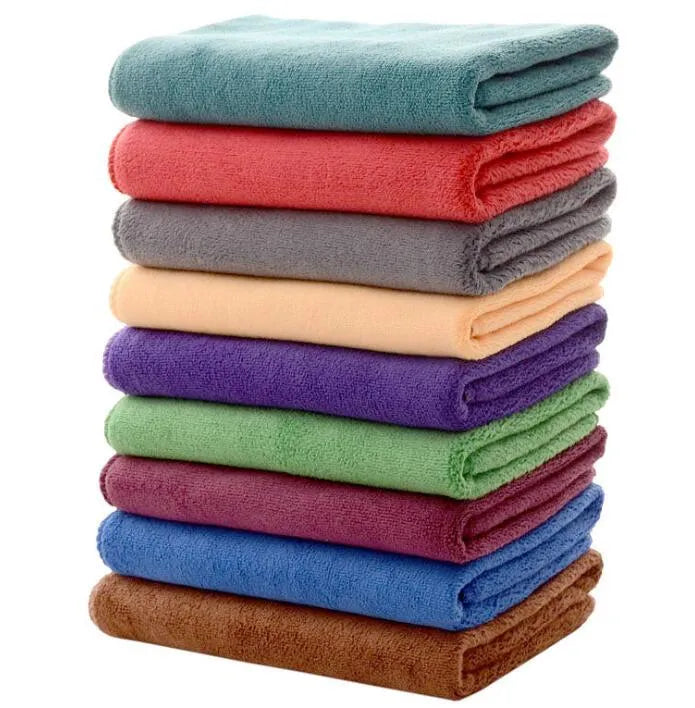 Microfiber pet towel in blue, folded, showing soft texture and size option