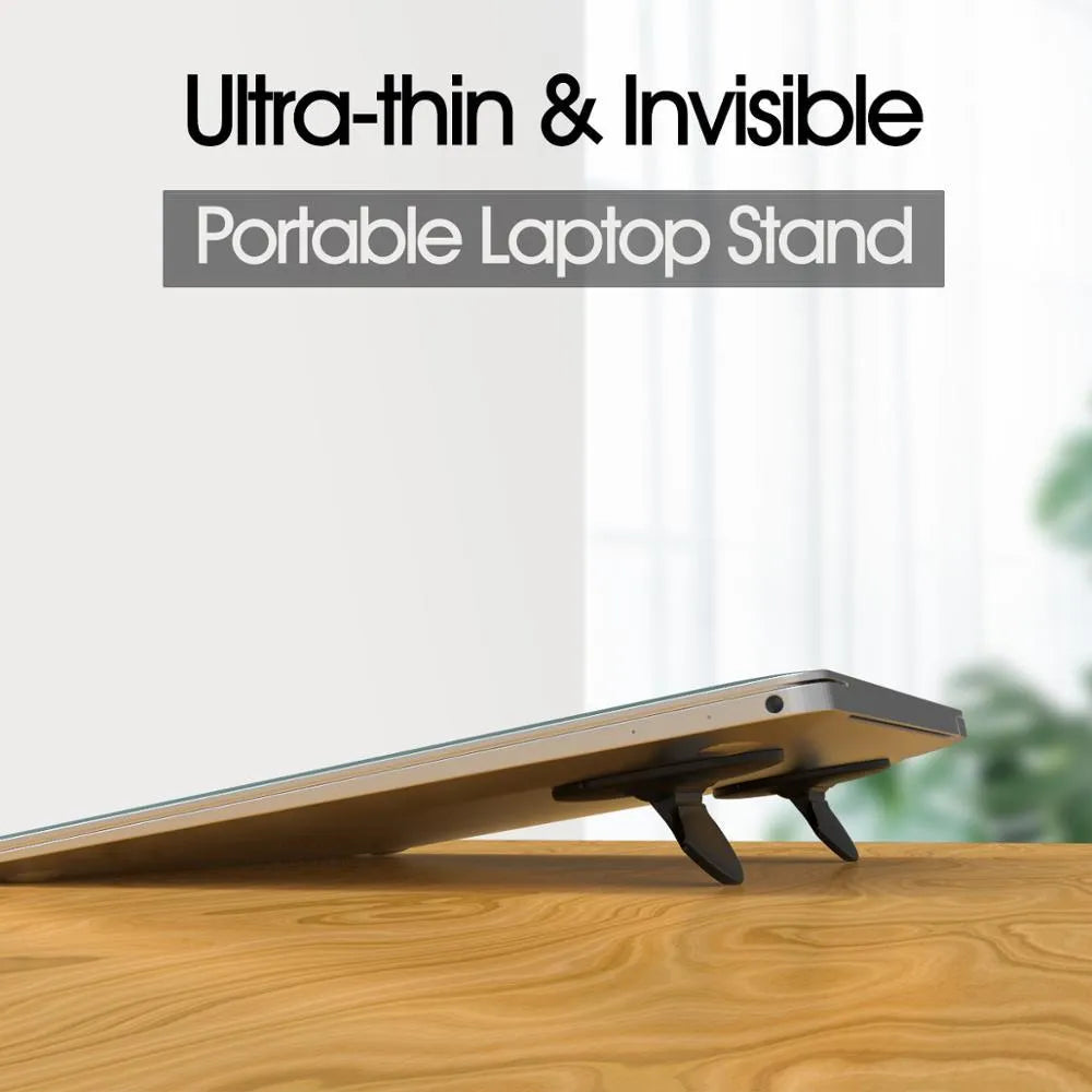 Two black ABS adjustable mini portable laptop stands on a desk under a silver laptop